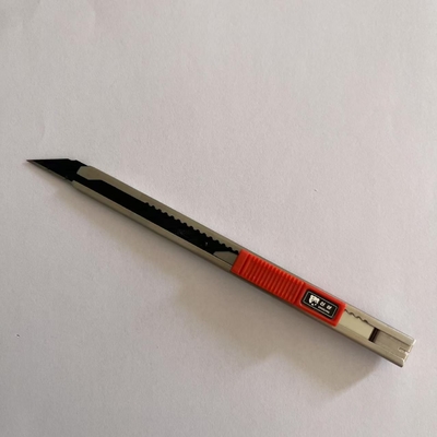 Versatile Small Cutter Blade for Opening Packages and Beyond